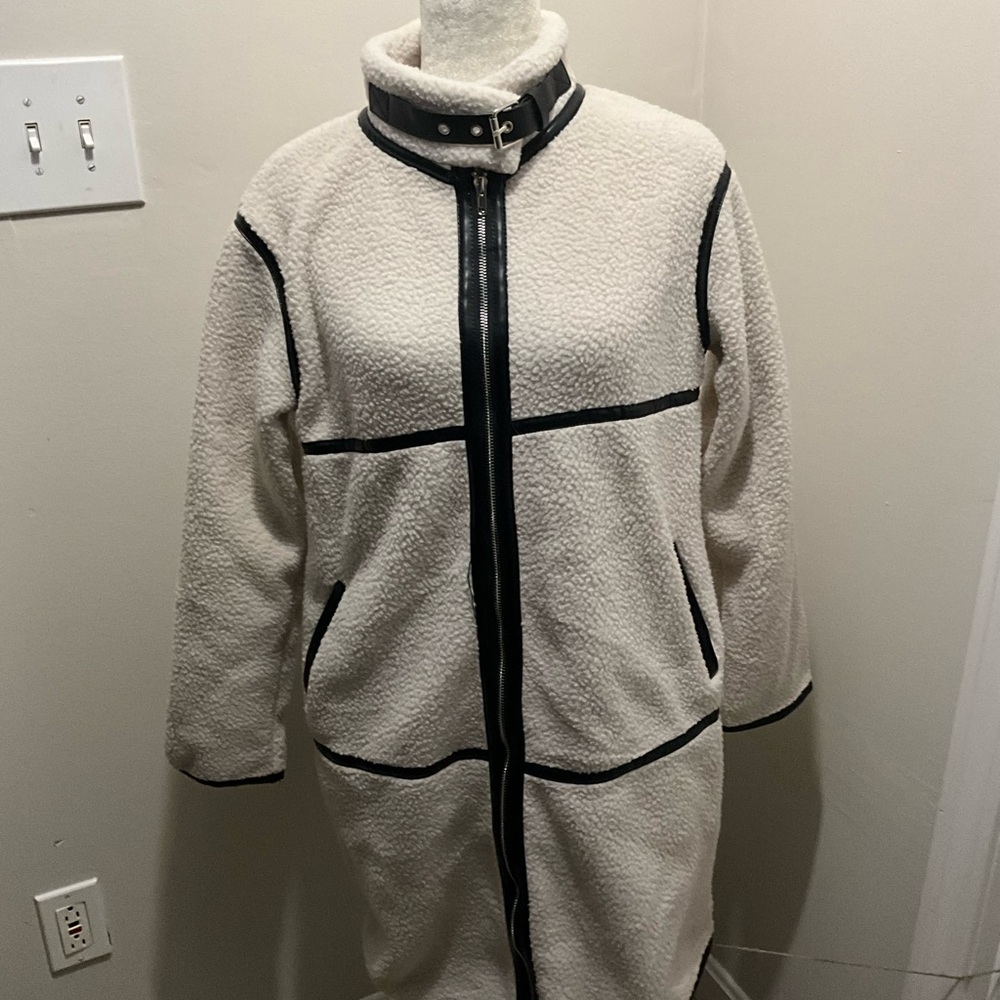 Cream faux shearling jacket with black faux leather details